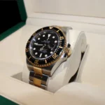 Rolex-Uhr in ihrer Box