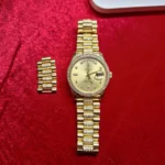 Rolex Day-Date in Gelbgold mit Diamantbesatz